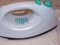 Aplicarea de motive termoadezive cu fierul de calcat - pasul 4